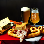 Still life with beer  pretzel  cheese and salami